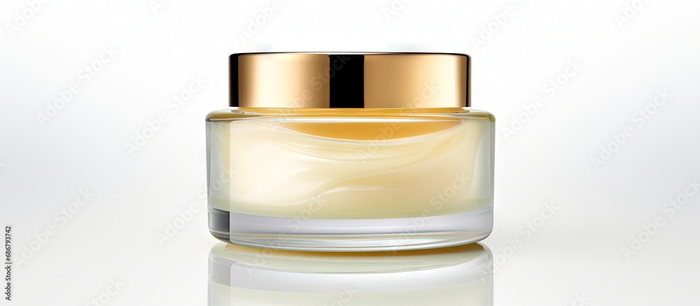 Poster Golden glass jar isolated on white background Copy space image Place for adding text or design