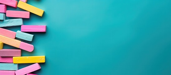 Pastel colored hashtag made with crossed chalks on a turquoise background representing social media networking and blogging Girlish hipster style Copy space image Place for adding text or desig