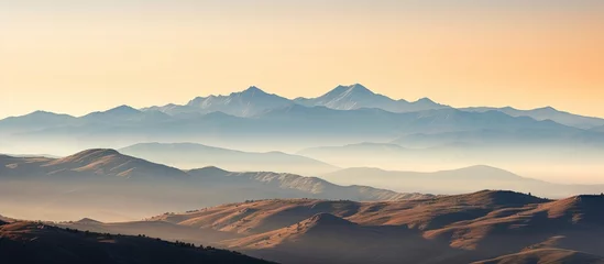 Fototapeten Morning view of Sierra de Gredos from Hoyos del Espino Avila Spain The peaks of Gredos formation with Almanzor peak standing out Copy space image Place for adding text or design © HN Works