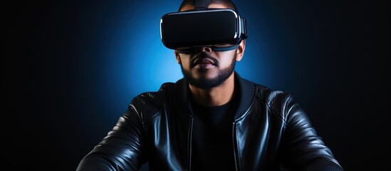 Man wearing digital glasses using a laptop to experience virtual reality with VR headset technology Copy space image Place for adding text or design