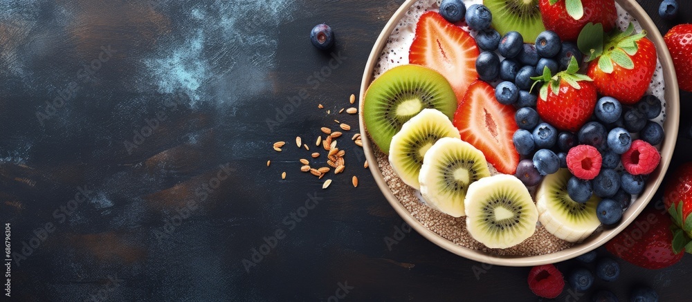 Poster Nutritious bowl of oats with fruits and chia Copy space image Place for adding text or design