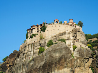 Fototapeta na wymiar The St Stephan's Monastery Sitting On Top a Rock Column in Meteora, Greece