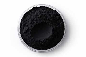 A luminous, dark hue of powdered makeup, creating a matte finish, portrays itself against a white backdrop.