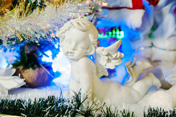 Christmas ornaments with a white baby angel. 