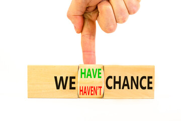 We have or not chance symbol. Concept word We have or have not chance on beautiful wooden cubes. Beautiful white table white background. Business and we have or not chance concept. Copy space.