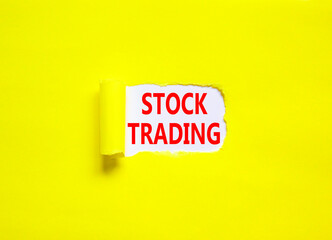 Stock trading symbol. Concept words Stock trading on beautiful white paper. Beautiful yellow paper background. Business stock trading concept. Copy space.