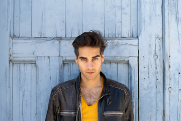 Portrait of serious man wearing leather jacket