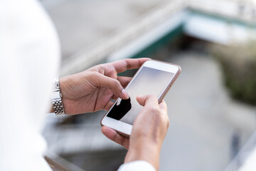 Close-up of woman using smartphone