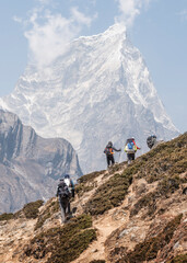 Fototapeta na wymiar Nepal, Solo Khumbu, Everest, Group of mounaineers hiking at Dingboche