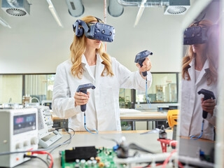 Female technician working with 3D glasses