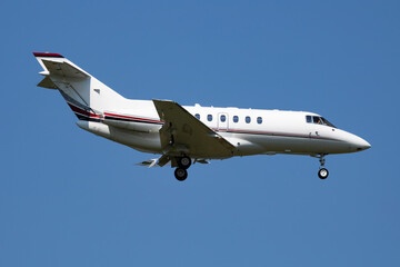 Untitled business jet passenger plane at airport. Corporate flight travel. Aviation and aircraft....