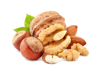 Hazelnuts, walnuts and almonds   in closeup isolated on white background. Assorted nuts. Nuts with leaves.