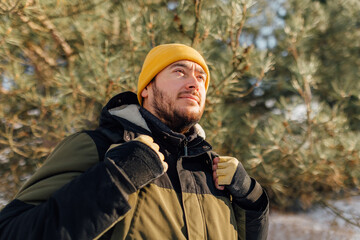 Frozen Exploration Hispanic Trekker Embraces the Icy Wilderness