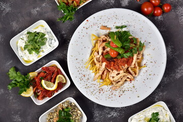 Chicken dinner and various appetizers