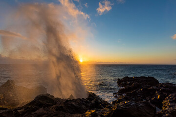 Reunion, West Coast, rocky coast at Souffleur, water fountain at sunset