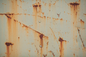 Rusty metal texture background. Old dirty wall background design. Colored texture background cracked paint. Heavy rusted peeled metal texture. Abstract grunge wall texture.