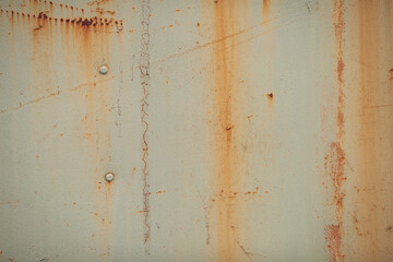 Rusty metal texture background. Old dirty wall background design. Colored texture background cracked paint. Heavy rusted peeled metal texture. Abstract grunge wall texture.