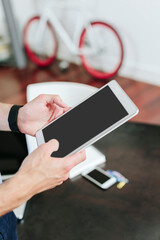 Young businessman holding digital tablet