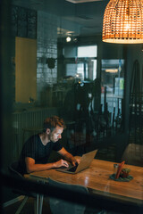 Man working overtime in his own start up business