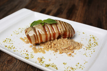 Pumpkin dessert with tahini and hazelnuts