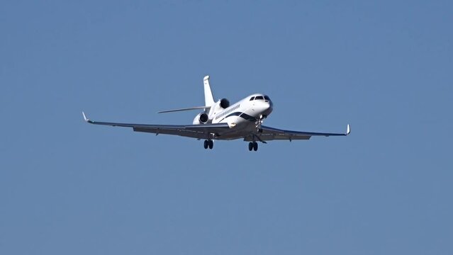 Business Aircraft Jet Private Executive Corporate Slow Motion Landing Final Approach into Airport Airfield arrival arriving