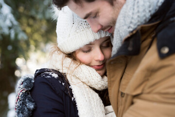 Happy young couple in winter