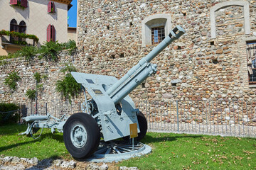 Cannon from the 2nd World War on display in the old town of Cavriana, Italy.