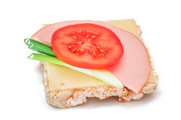 Rice Cake Sandwich with Tomato, Sausage, Green Onions and Cheese - Isolated on White. Easy...