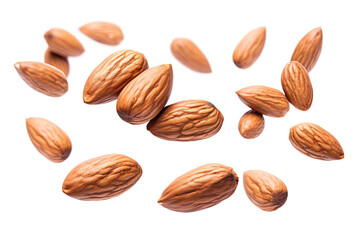 Obraz premium Almonds fall in pile on white background. Creative concept of floating healthy snacks. Background of falling almonds. Levitation of nuts. Close-up. Copy space.