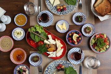 Breakfast with toast, tea and orange juice