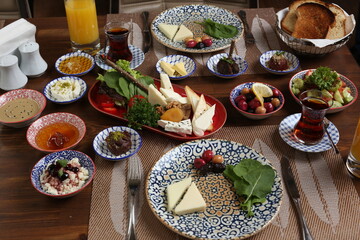 Breakfast with toast, tea and orange juice