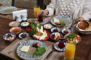 Breakfast with toast, tea and orange juice