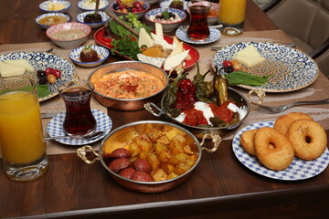 Breakfast with toast, tea and orange juice