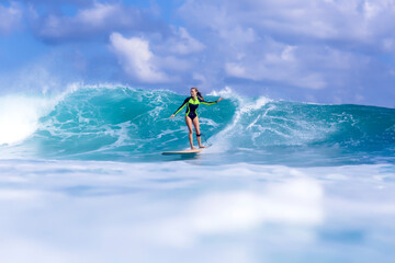 Indonesia, Bali, woman surfing