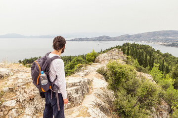 Greece, Volos, man enjoying view to Pagasetic Gulf