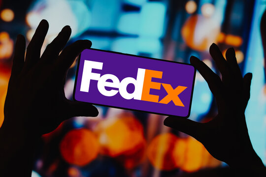 December 1, 2023, Brazil. In this photo illustration, the FedEx logo is displayed on a smartphone screen.
