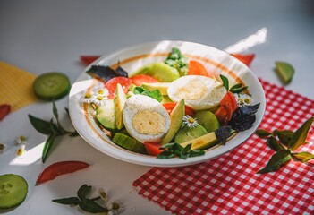 Breakfast with egg and vegetable salad