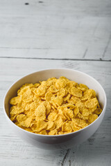 White bowl of corn flakes
