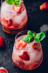 Cocktail with strawberry, vodka and tonic