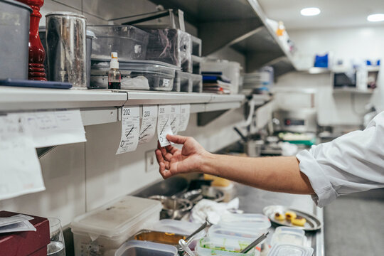 Gourmet chef holding an order