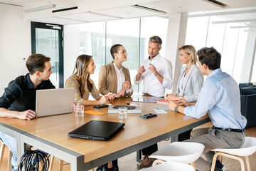 Business people having a workshop in office, discussing plans