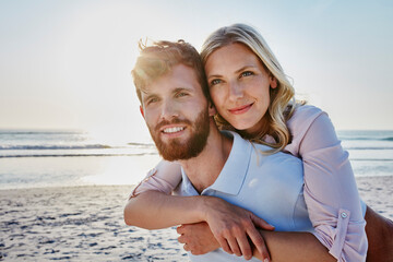 Portrait of happy couple on the beach - Powered by Adobe