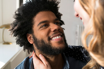 Close up of man smiling at woman