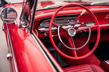 Classic car with a red interior 