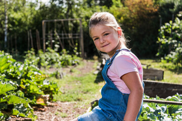 Portrait of confident girl in garden