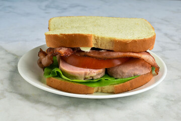  spam  top wit  tomato and bacon on white bread