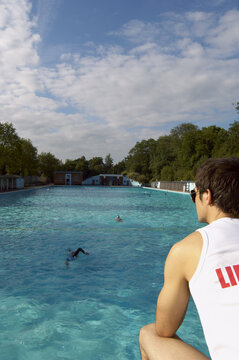 Lifeguard Watching Swimming Pool