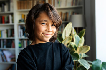 Portrait of smiling boy at home