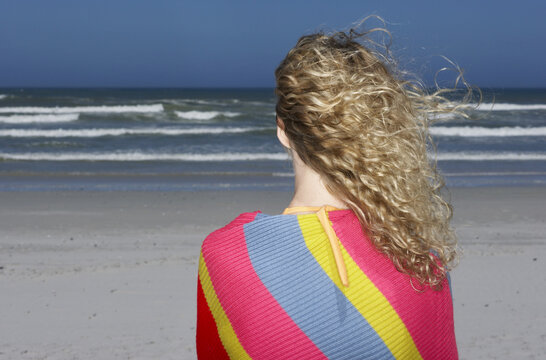 Young Woman On The Beach