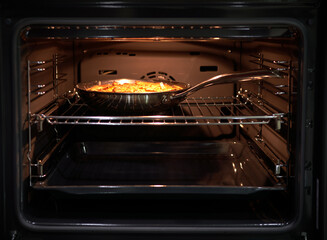 pie being cooked in the oven in the kitchen